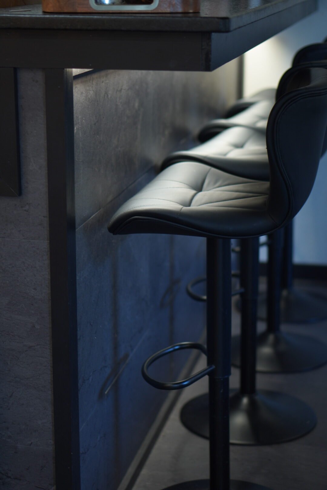 Bar seating at The Refinery