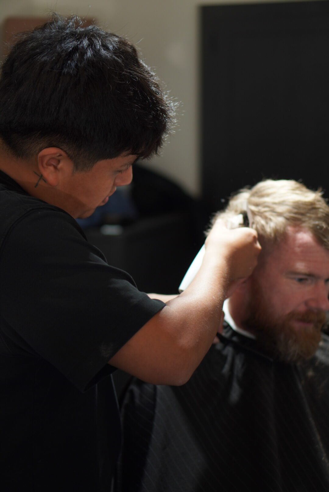 Brandon Mendoza, master barber at The Refinery