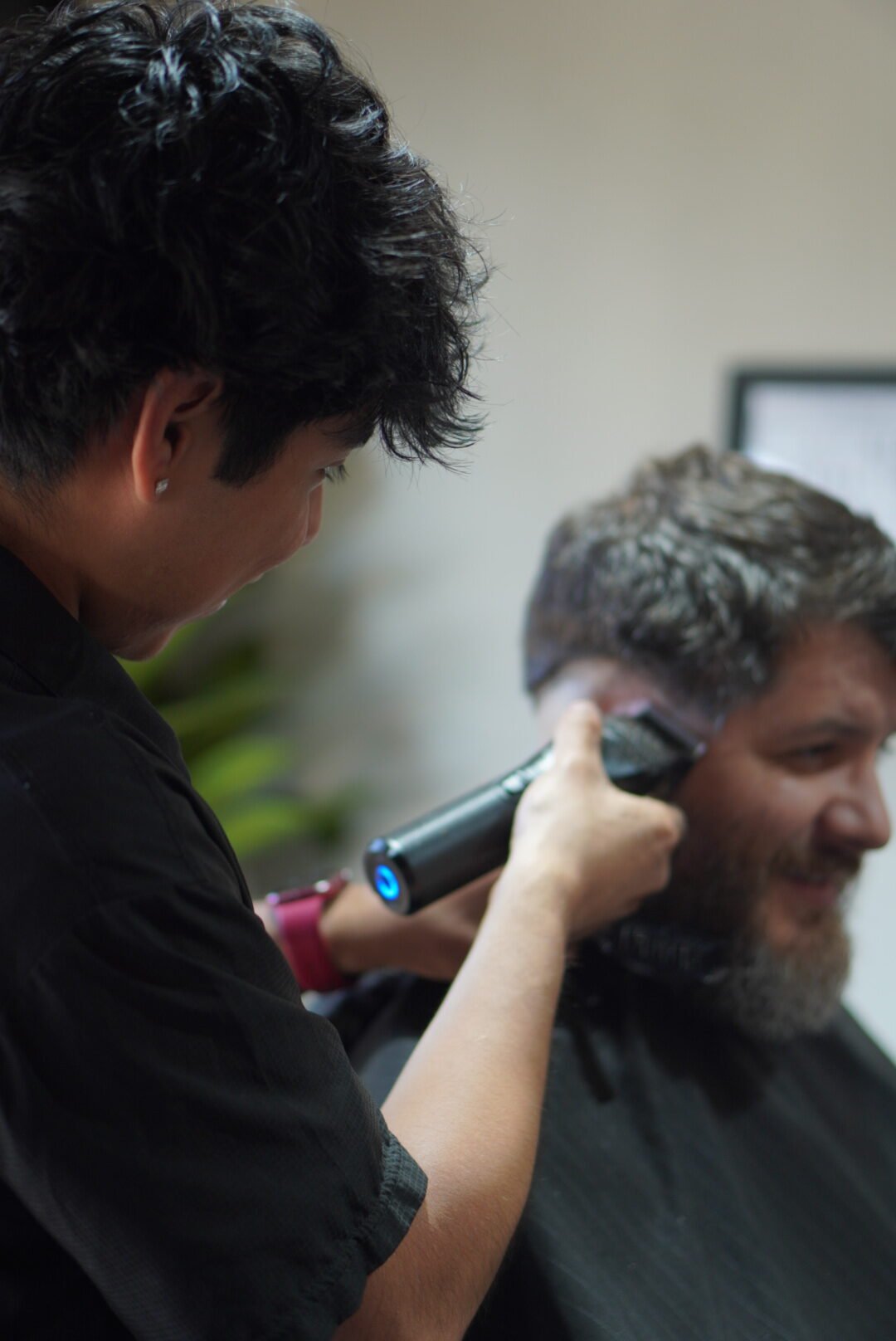 Joel Mendoza, barber at The Refinery